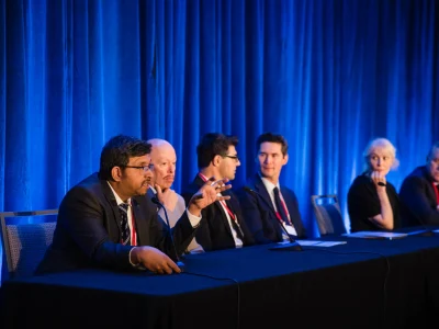 Dr. Bhaskar Srinivasan speaking during a panel discussion at the 34th Biennial Cornea Conference, Boston